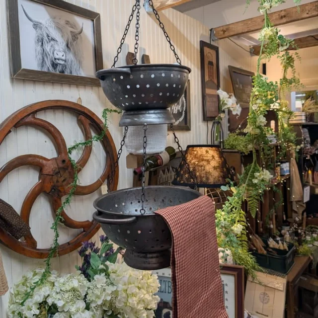 Loving this hanging vegetable (or whatever you want) made from vintage colanders!