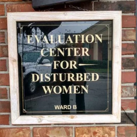 'Evaluation Center For Disturbed Women' Sign
